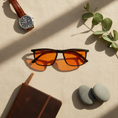 Load image into Gallery viewer, Amber glasses lifestyle flat lay