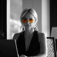 Load image into Gallery viewer, Woman wearing sunglasses with a blurred background