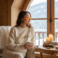 Load image into Gallery viewer, Woman sitting by window wearing Prettier in Pink daytime computer glasses
