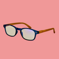Load image into Gallery viewer, Blue-framed glasses with wooden arms on a beige background
